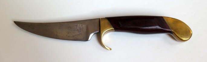 Colt U1120 General Purpose knife with a 4.5 in. blade and rosewood handle