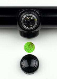 Screw cap removed from turret